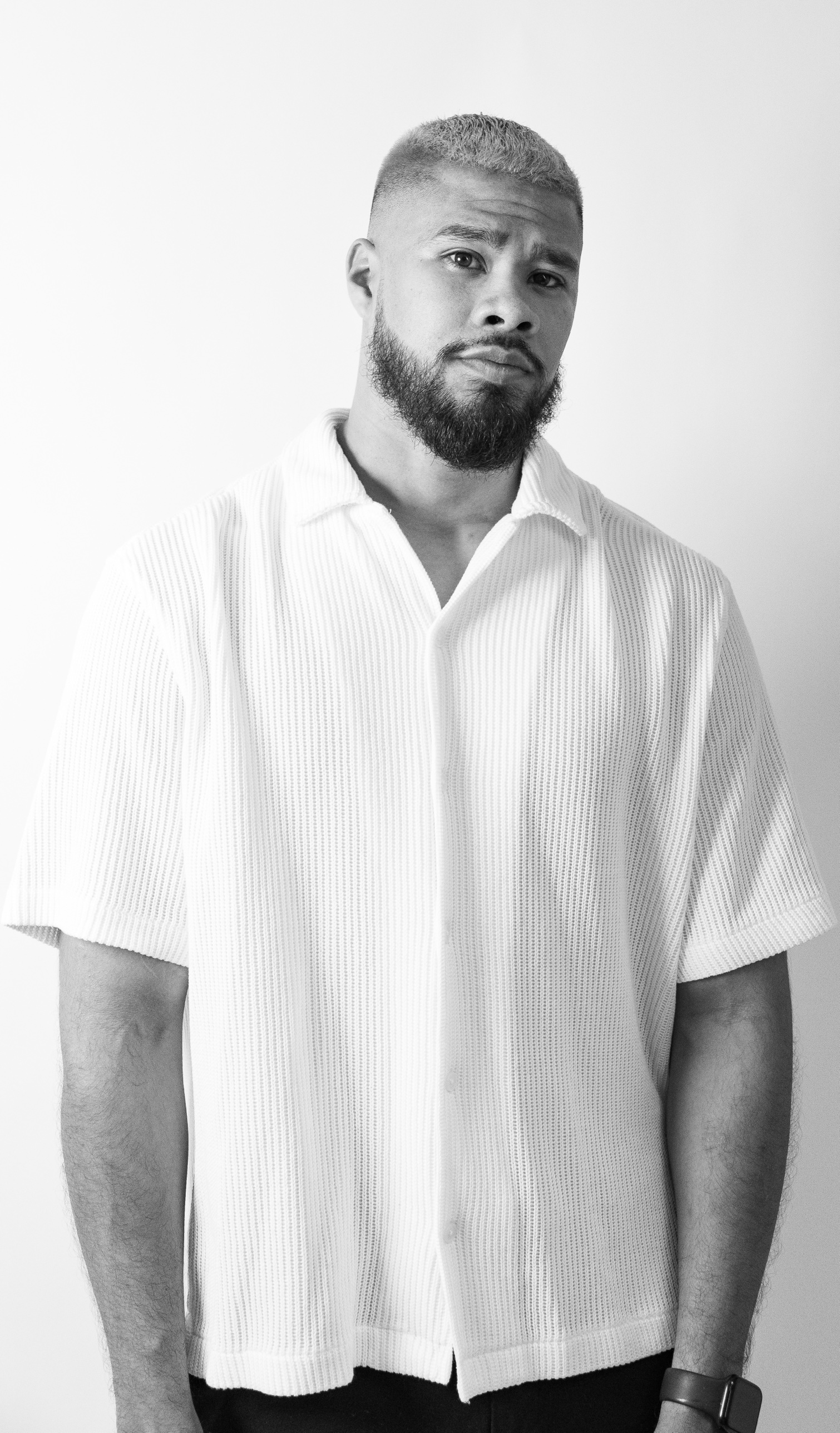 Black and white portrait on white backdrop