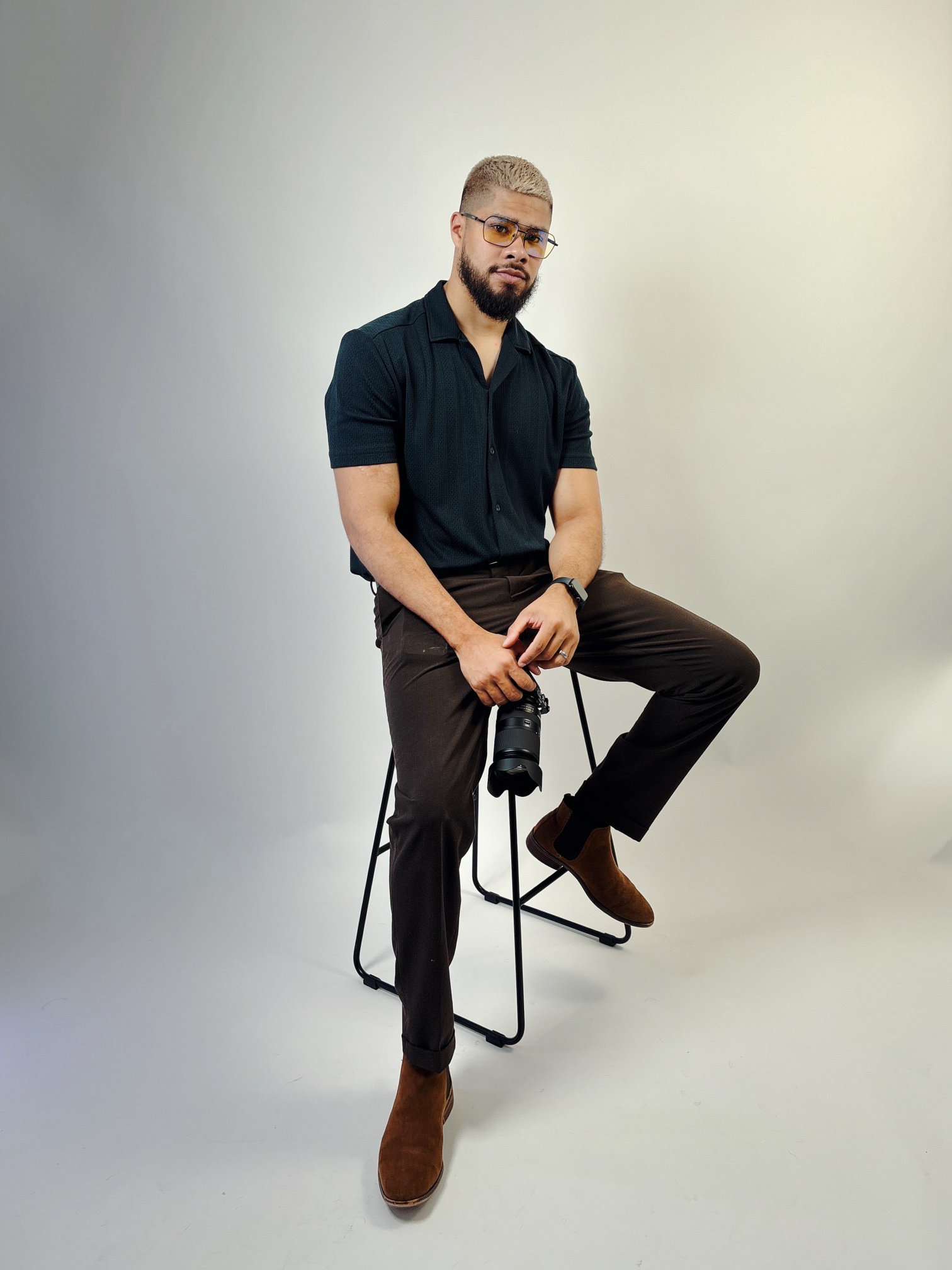 Portrait seated on a stool in Wetsly Photo Studio
