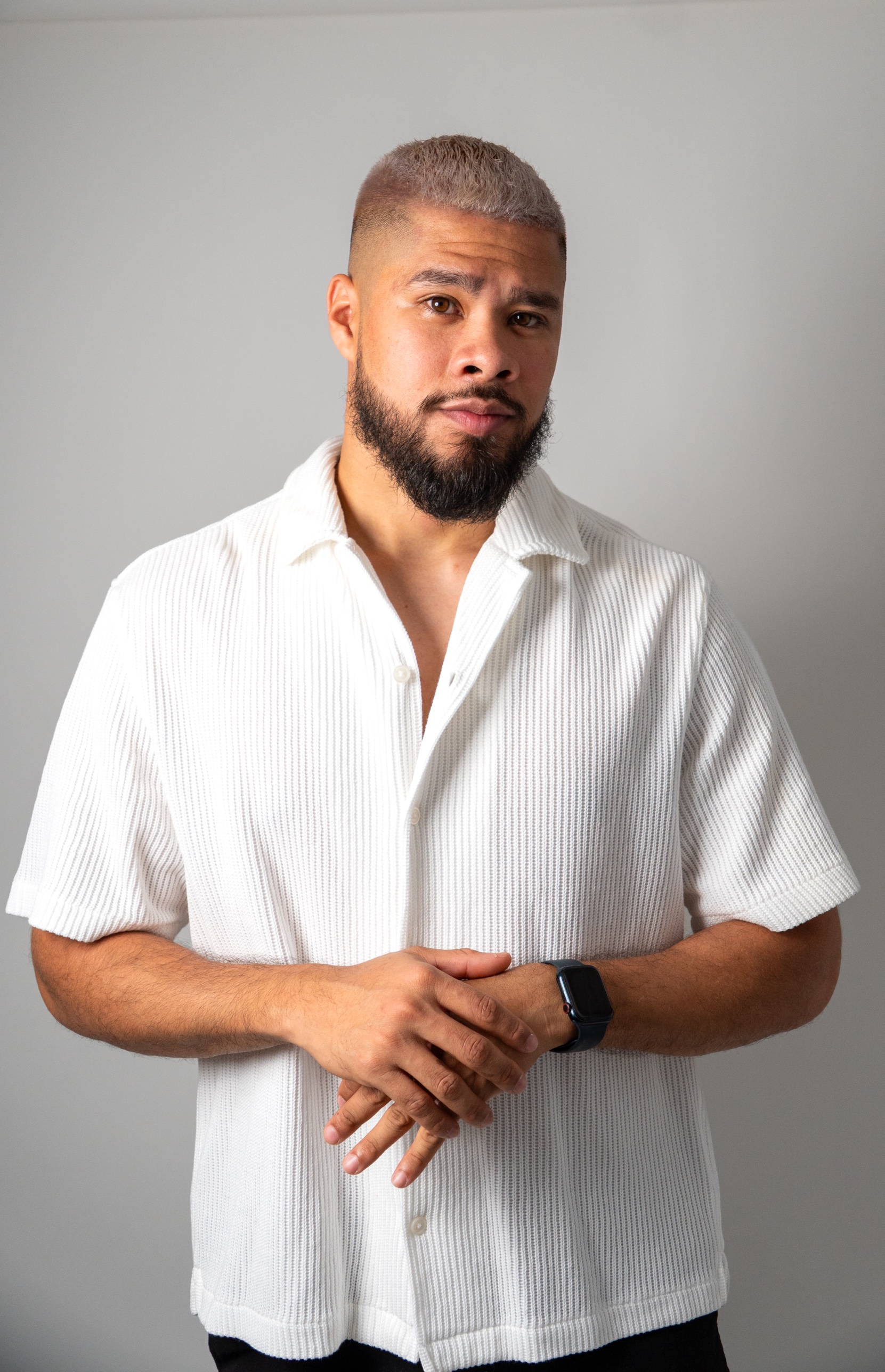 Studio portrait, hands together